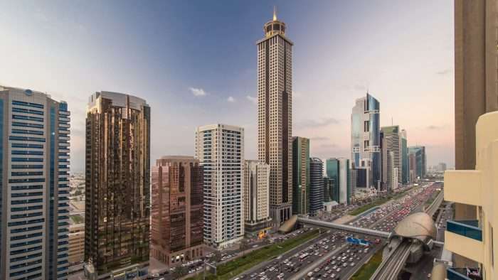 Downtown,Dubai,Towers,Day,To,Night,Transition,Timelapse.,Aerial,View