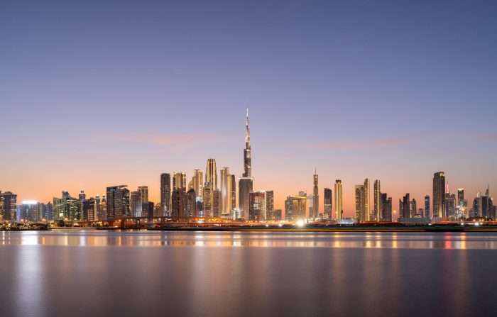 A,Panoramic,View,Of,Dubais,Modern,Skyline,At,Sunset,,Showcasing