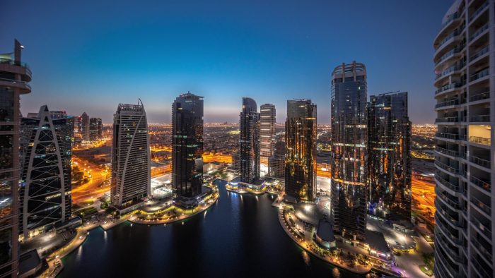 Tall,Residential,Buildings,Panorama,At,Jlt,District,Aerial,Night,To