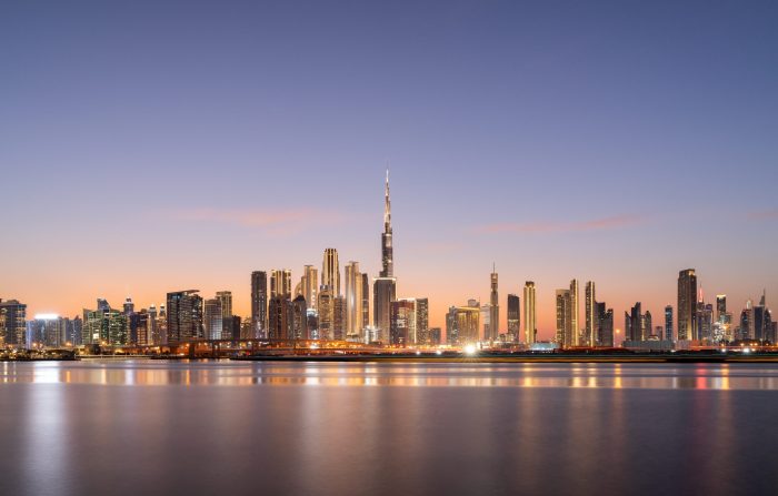A,Panoramic,View,Of,Dubais,Modern,Skyline,At,Sunset,,Showcasing